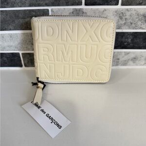 Comme des Garçons Embossed Logo Zip Wallet - Cream